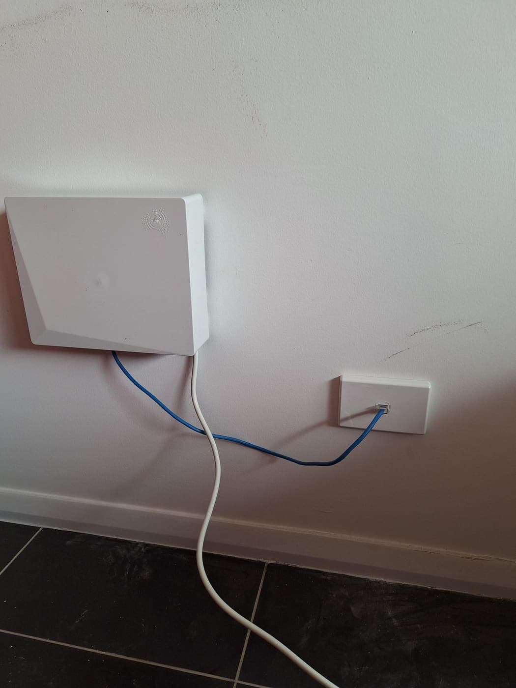 NBN connection box and data point wired with an ethernet cable