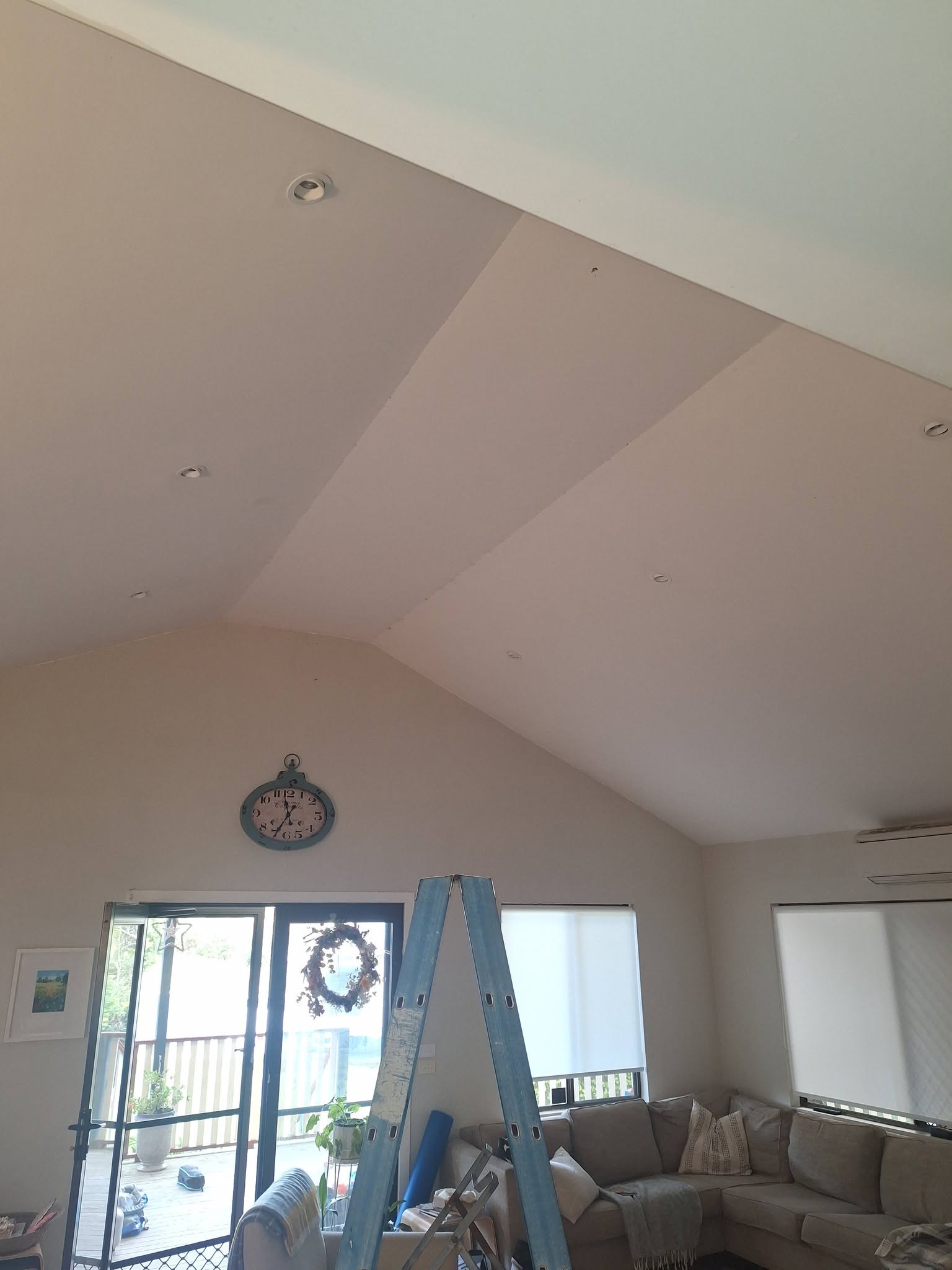 Vaulted living-room ceiling fitted with new LED downlights